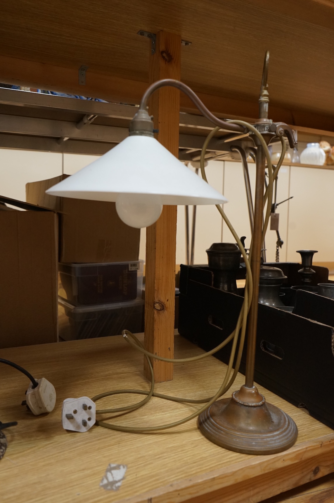 Two lamps comprising a 1960s Herdu ceramic lamp together with a brass and copper adjustable desk lamp, largest 56cm high